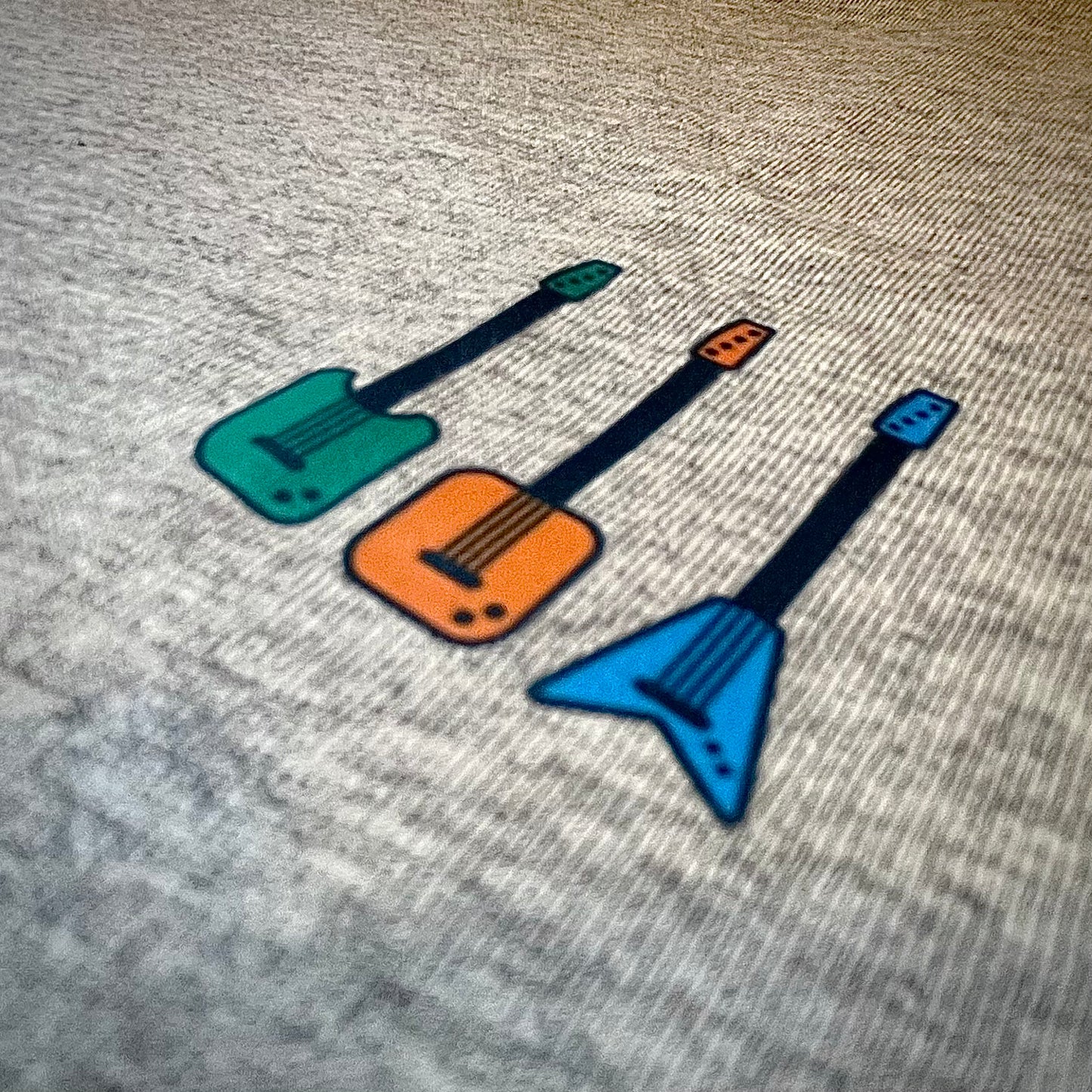 Camiseta gris Guitarras